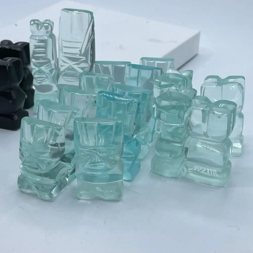 Aztec style chess pieces black obsidian green glass or onyx.